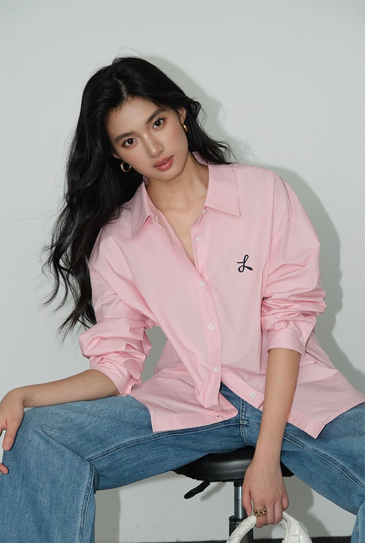 Pastel pink relaxed fit embroidered long-sleeve shirt with rolled-up sleeves and casual Korean streetwear styling