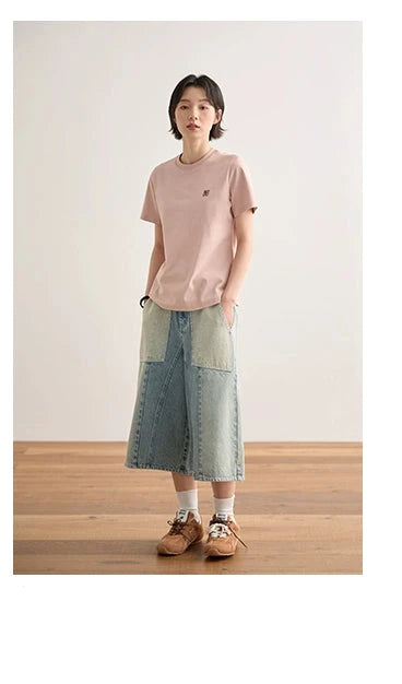 Dusty pink minimalist embroidered logo crew neck t-shirt full body patchwork denim midi skirt styling