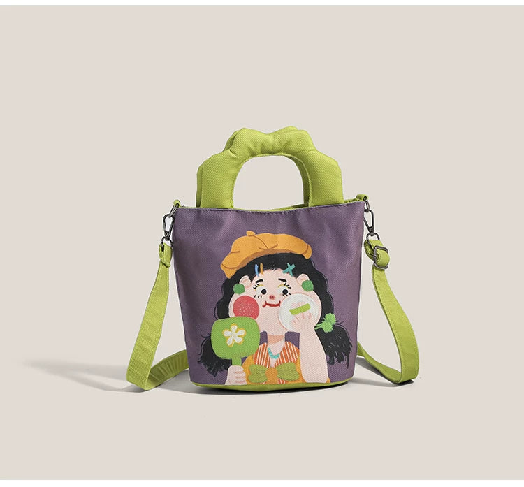 Close-up detail of cartoon girl illustration print on canvas tote showing black line work and character expression streetwear aesthetic