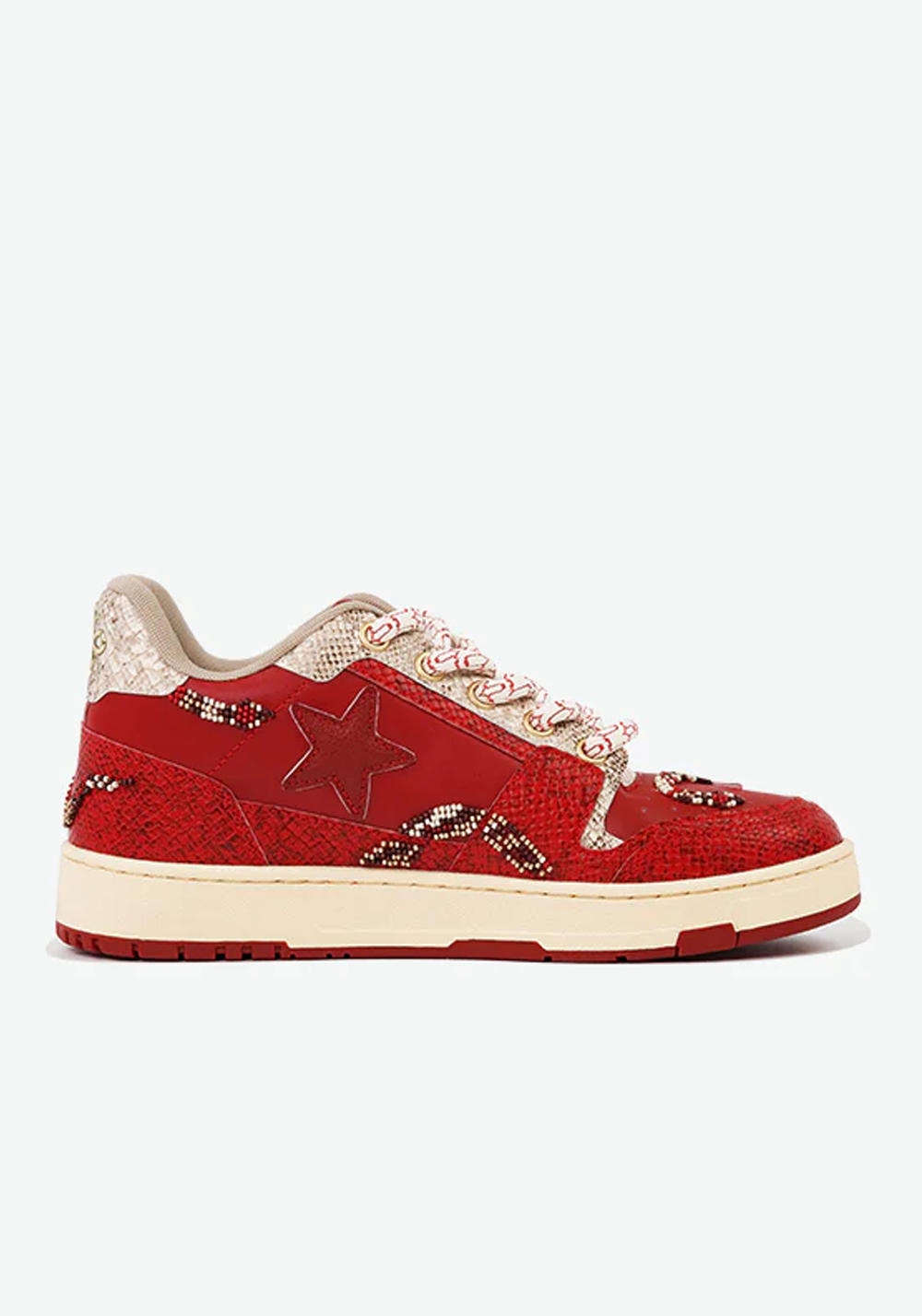 Statement red star court sneakers with snake-inspired embossed texture and distinctive pink-silver rope laces