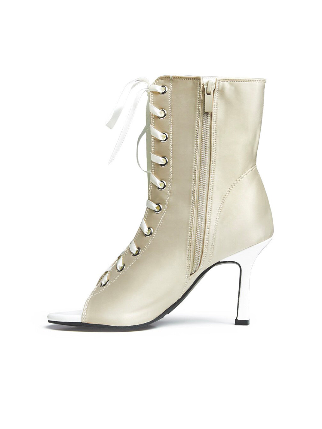 Women's satin peep-toe ankle heels with ribbon laces and slim stiletto heel shown in close-up