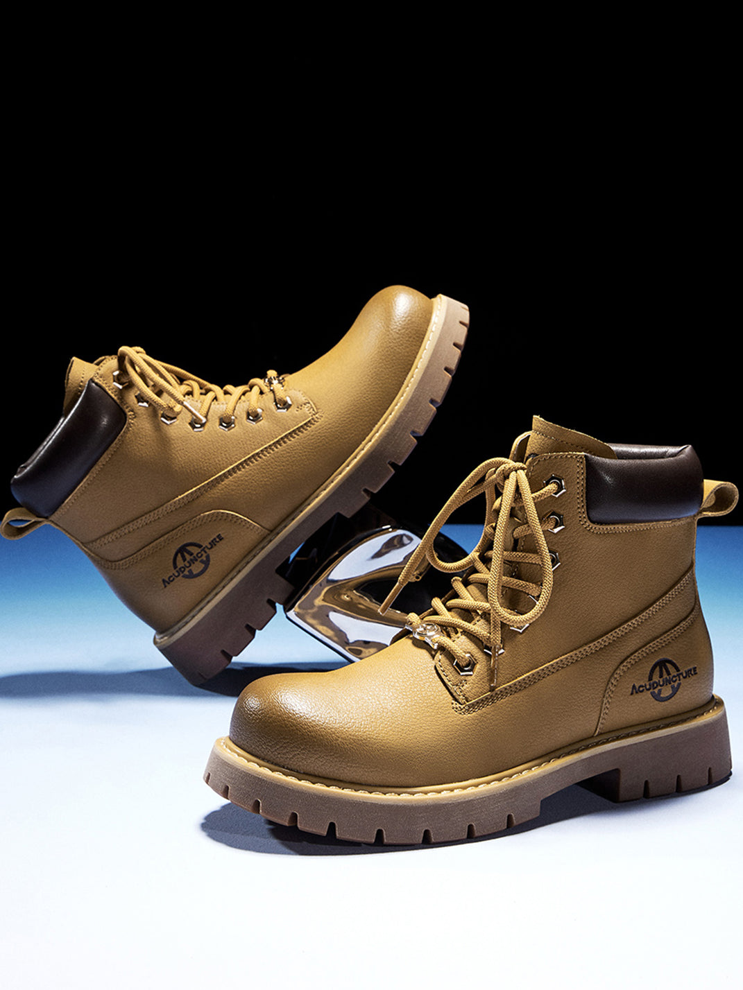Single tactical zip-front ankle boot right side view metal stand dark studio heel pull tab branded logo
