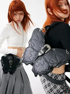 Black 3D punk butterfly bags in medium and small sizes styled by Y2K alternative fashion models