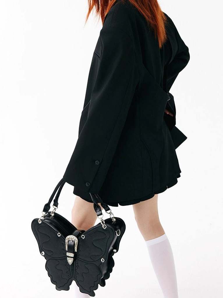 Black 3D punk butterfly handbag carried by top handles with matte PU finish and silver hardware