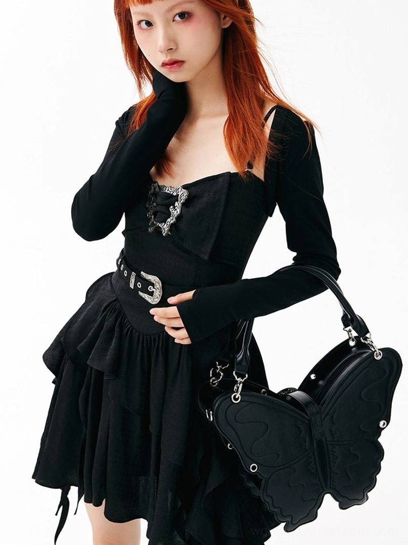 3D punk butterfly bag product detail view with sculptural wing silhouette and silver buckle accent