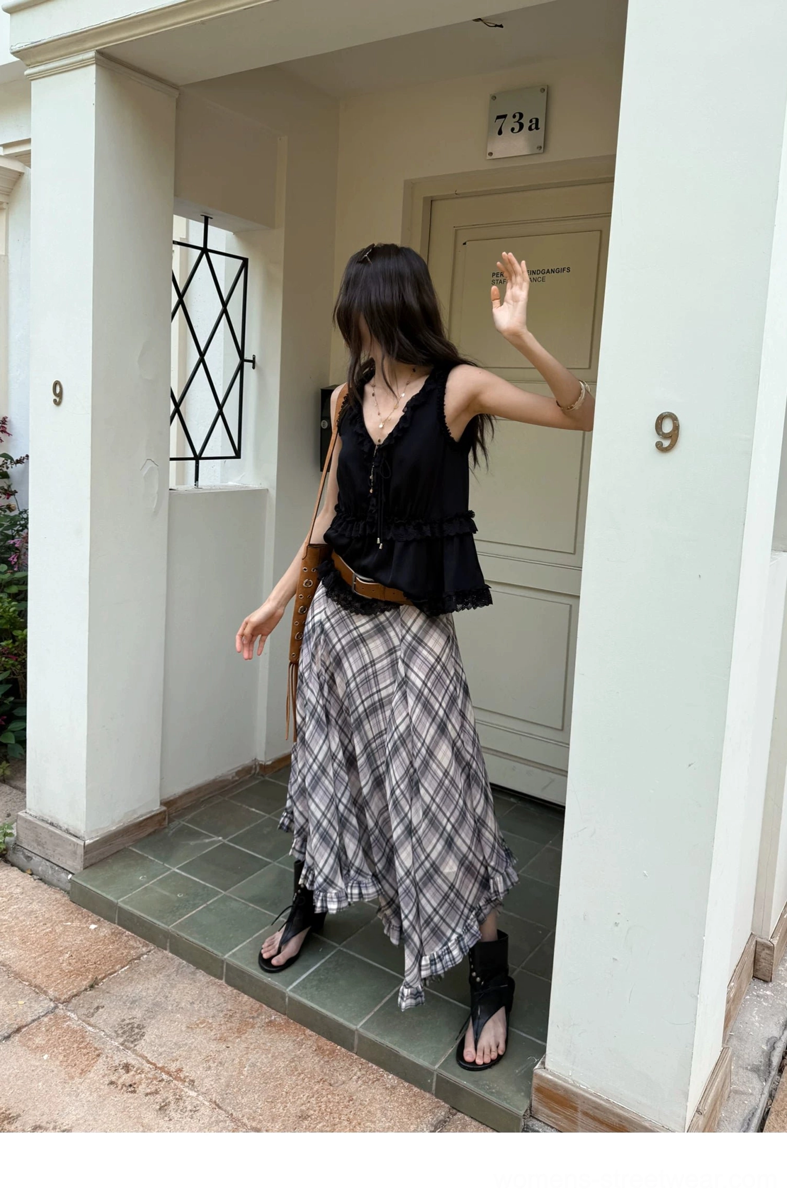 A-line plaid chiffon maxi skirt with a soft drape and flowing asymmetric hem for modern streetwear outfits
