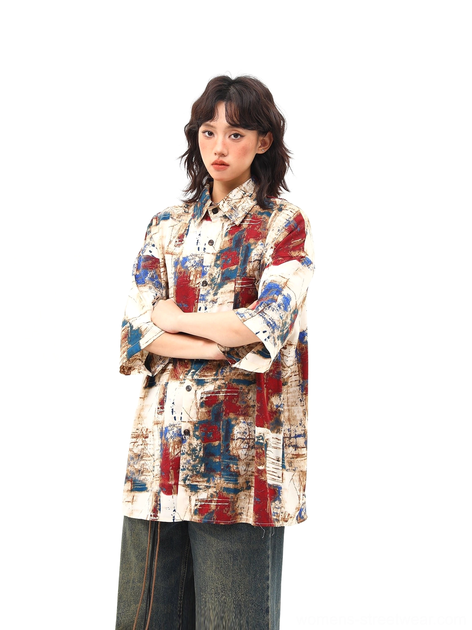 Front detail of abstract brushstroke print oversized short sleeve button up shirt with classic collar