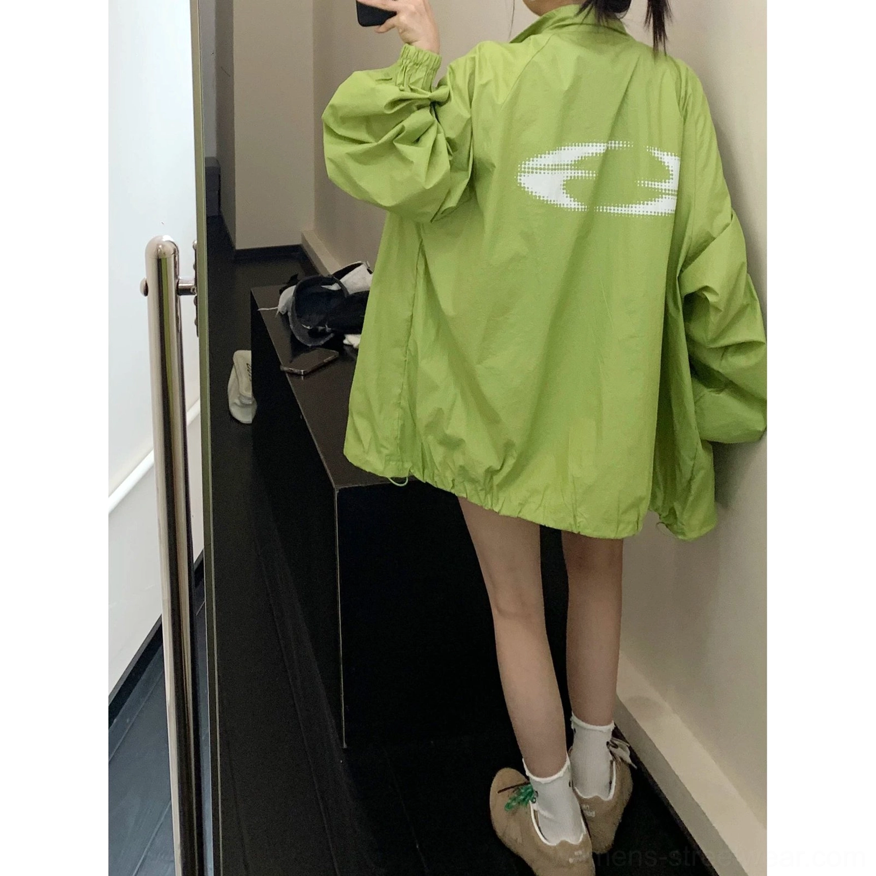 Acubi-inspired oversized windbreaker jacket product image with relaxed boxy proportions, lightweight construction, gathered hem, and long billowy sleeves