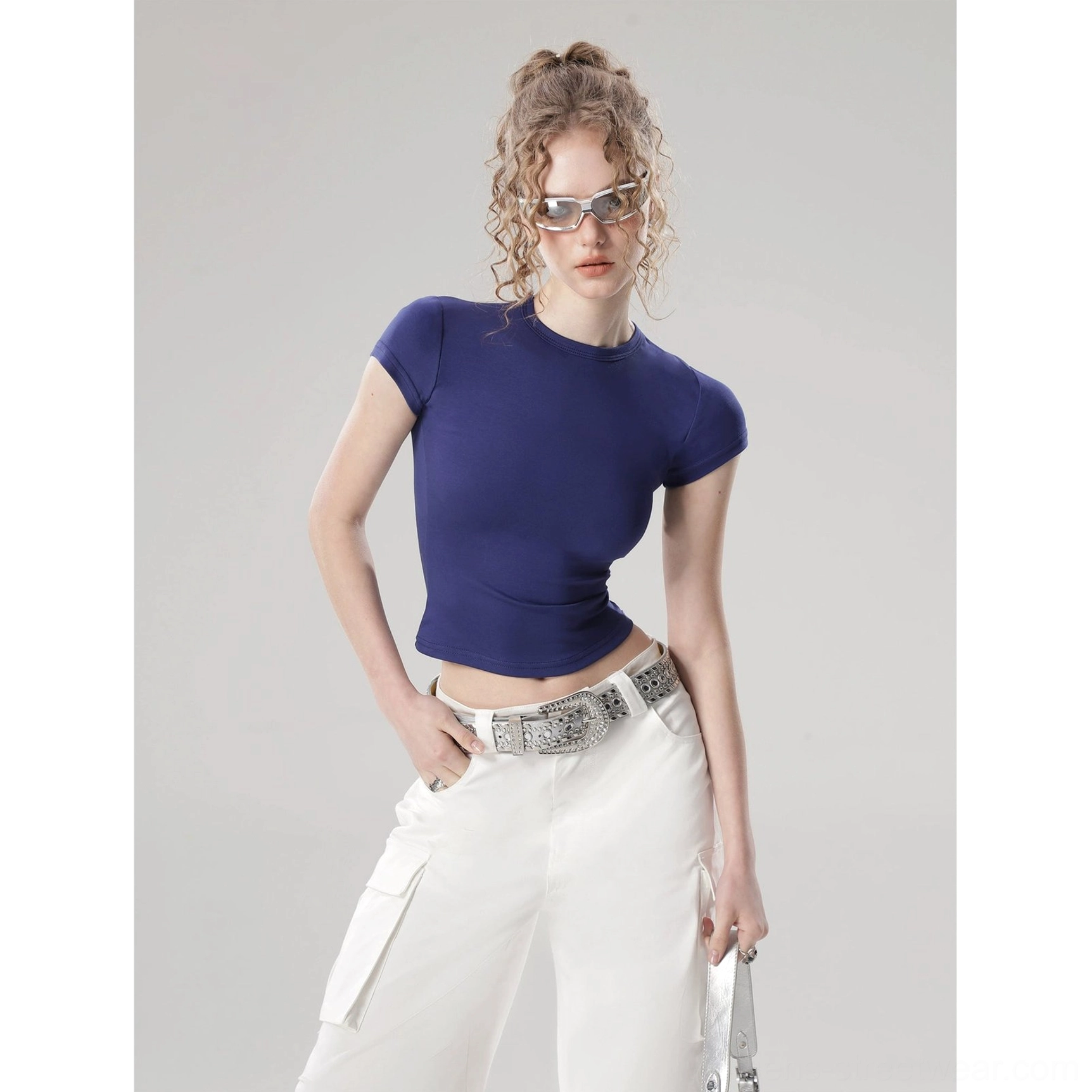 Acubi inspired solid color cropped top with clean crew neck and feminine short sleeve design