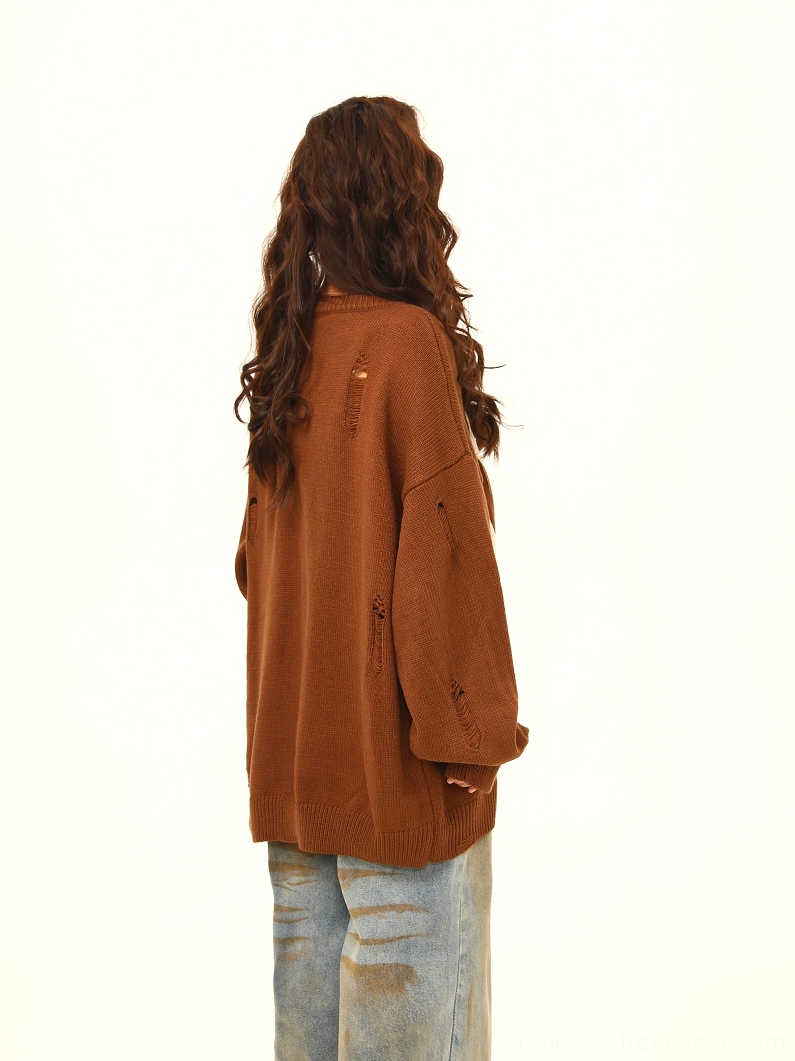 Back view of brown Agent Orange distressed oversized knit sweater with plain solid back and frayed hem
