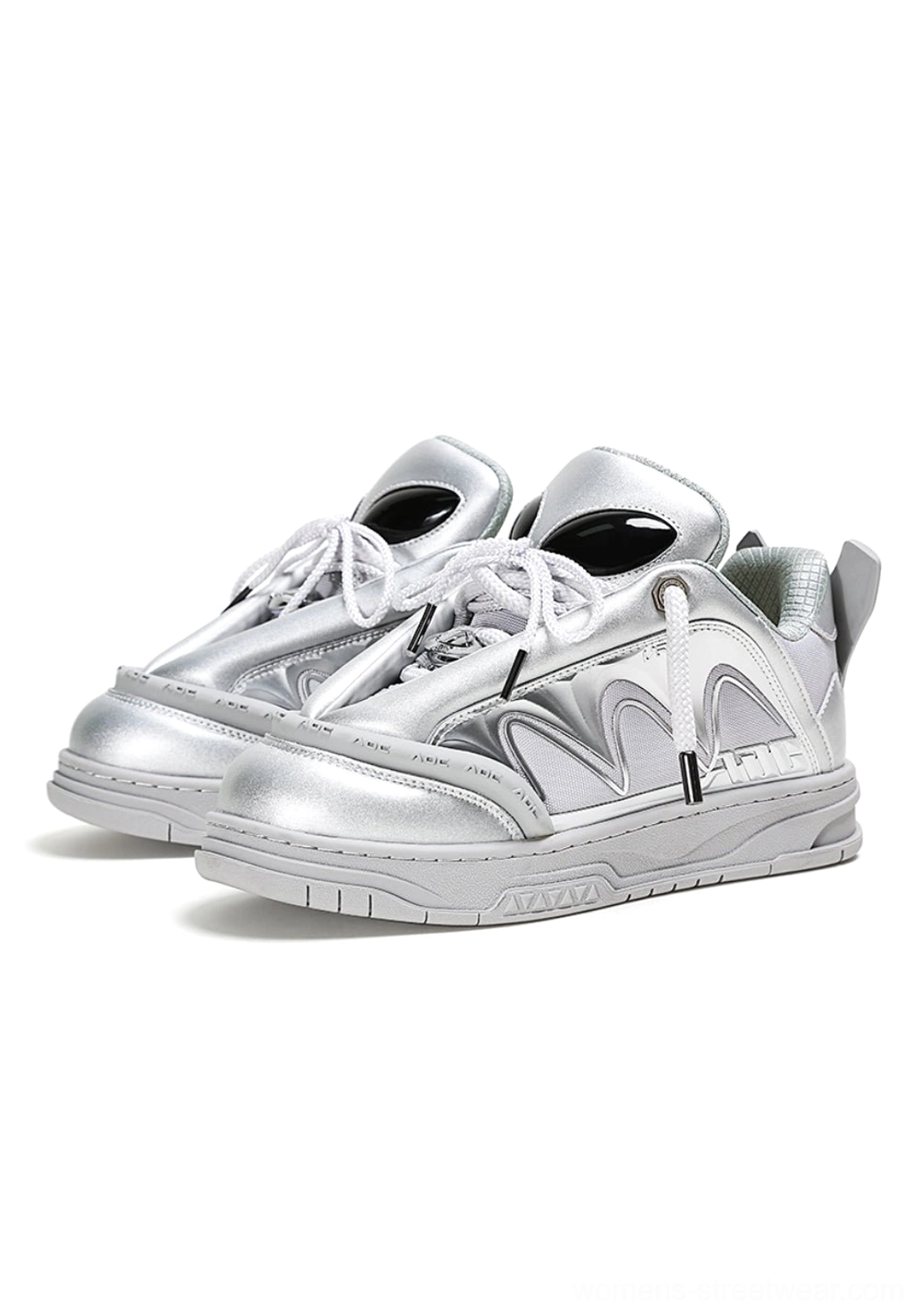Alien head platform sneakers showing rear heel design, pull tab, and elevated streetwear sole
