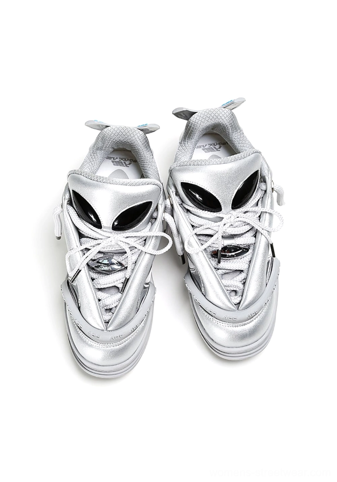 Alien head platform sneakers with sculpted platform base and extraterrestrial-inspired accent details