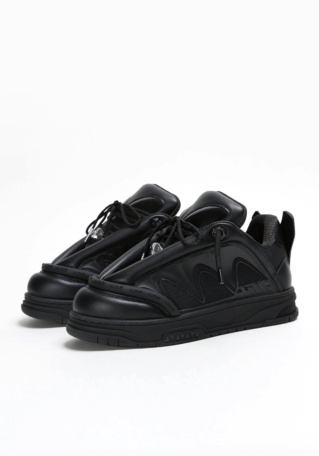 Alien head platform sneakers with smooth leather-look upper and bold futuristic streetwear proportions