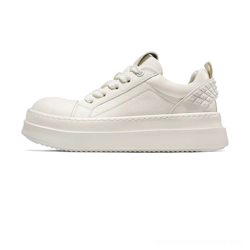 All-white low-top leather platform sneakers with smooth upper quilted heel detail and off-white sole side view