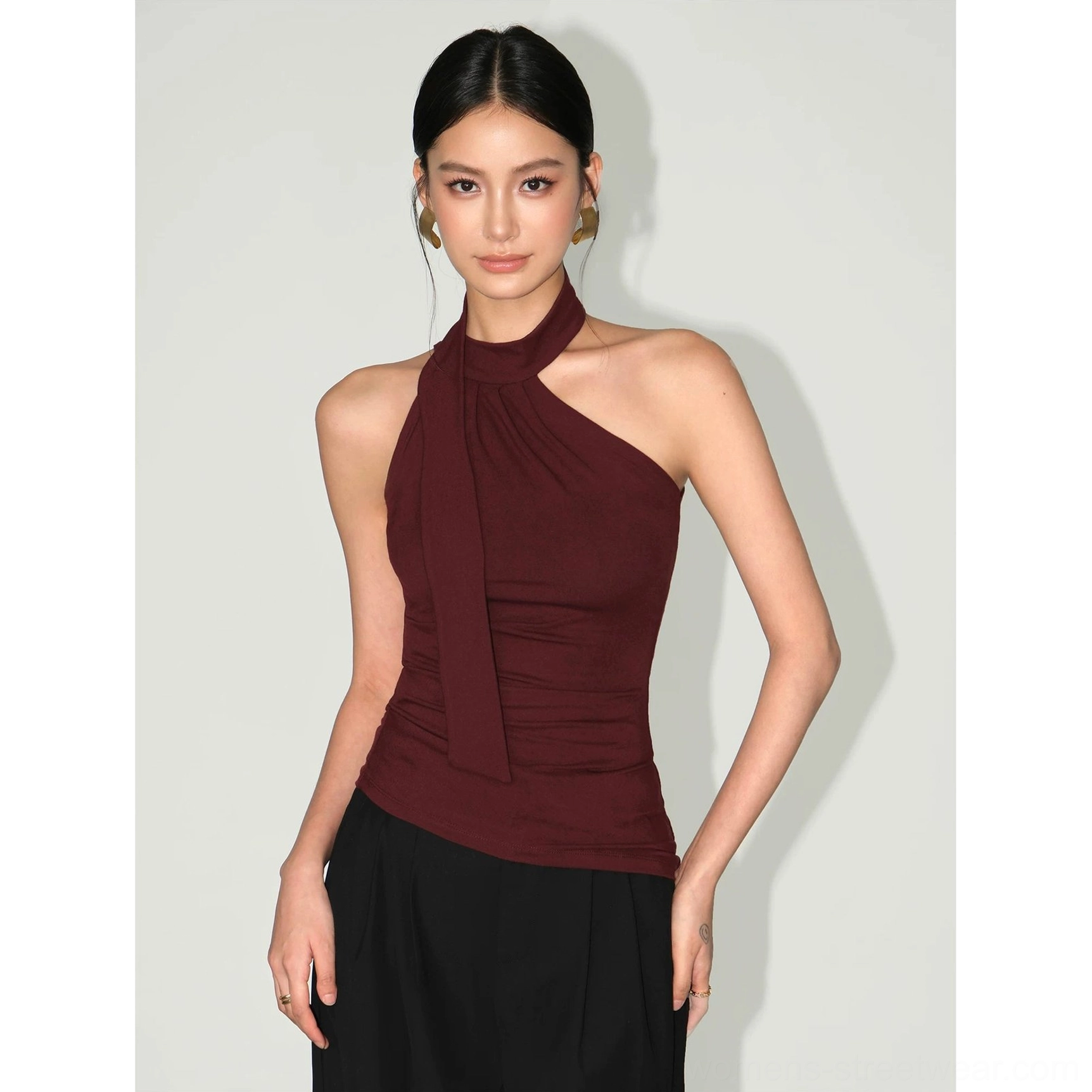 Angolan red fitted halter knit top with asymmetric hem and flowing draped neck sash for statement streetwear styling
