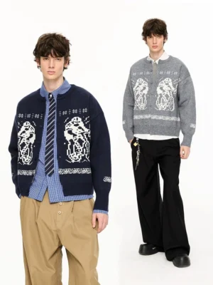 Two male models full-body wearing oversized animal motif knit cardigans with retro jacquard patterns in casual styling on white studio background