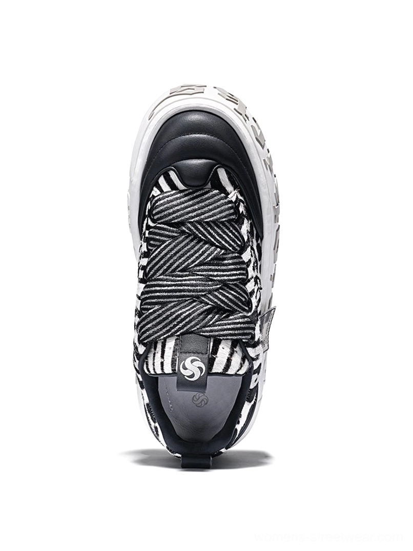 Animal print platform skate sneakers designed for oversized denim, cargo pants, skirts, and layered outfits