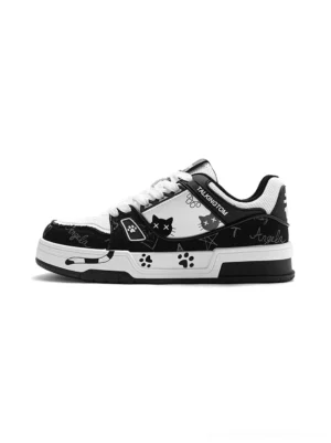 Black and white anime cat graphic chunky low-top streetwear sneaker side profile with paw prints and layered sole