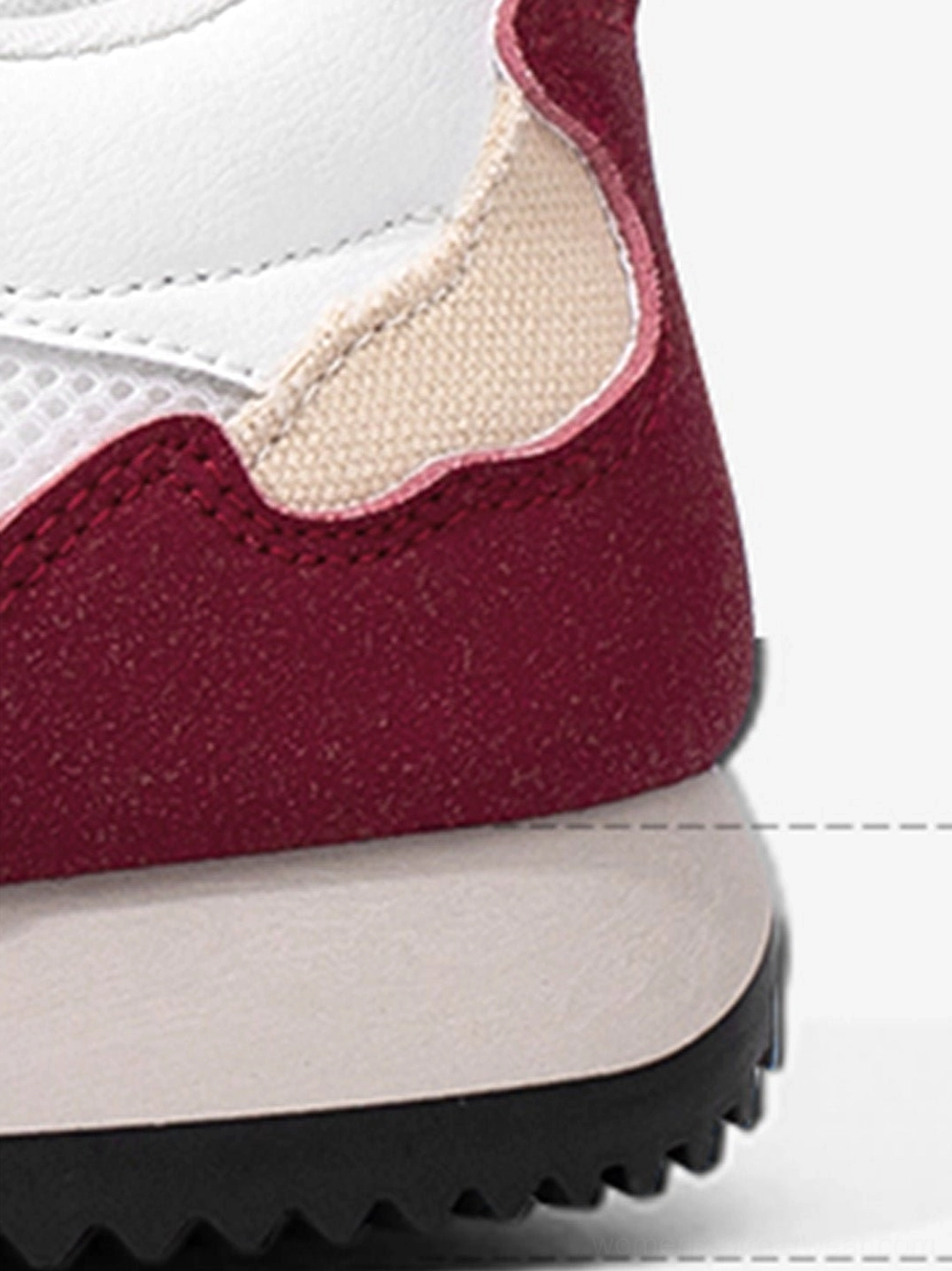 Women’s apple detail red mesh retro runner sneakers close-up showing apple-red overlays striped side panels and blue laces