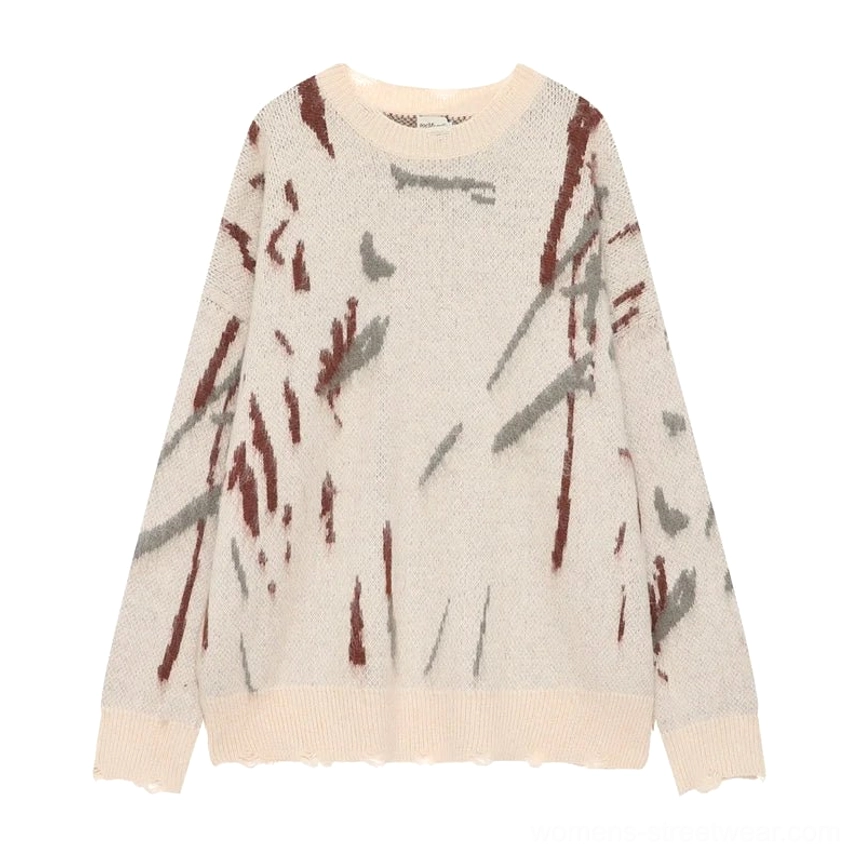 Apricot abstract graffiti oversized sweater flat lay with distressed cuffs hem and crew neck detail
