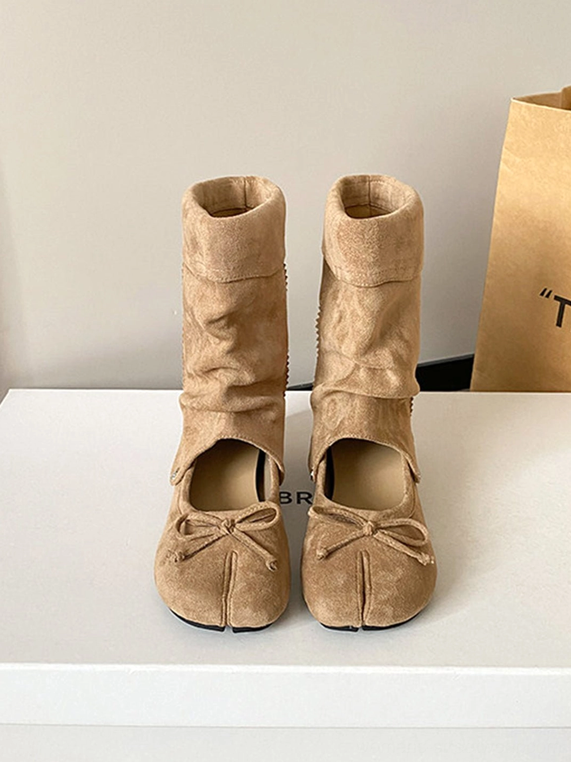 Apricot convertible tabi ballet sandal boots with split-toe bow, flat sole and detachable rolled slouchy shaft
