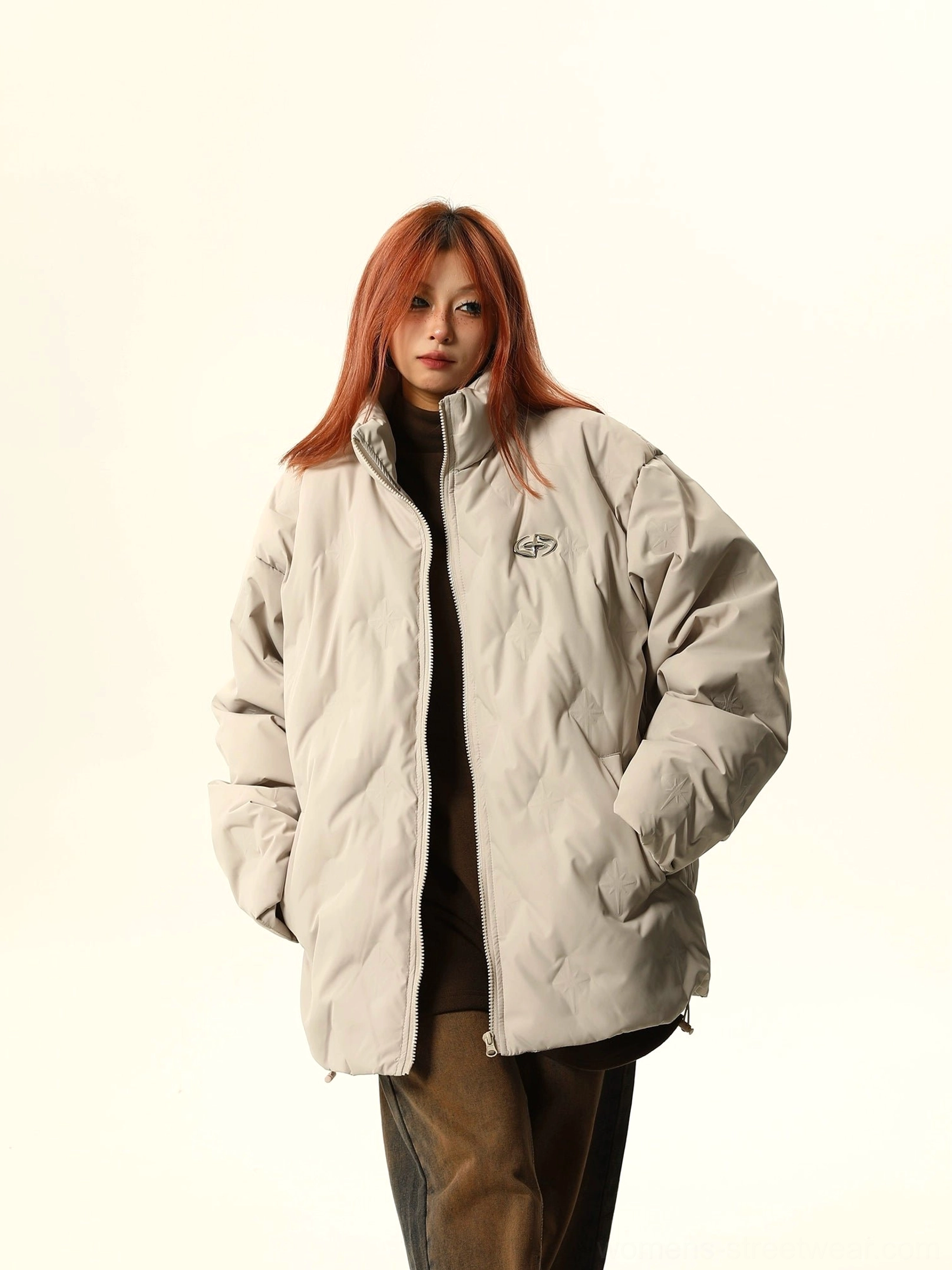 Apricot oversized diamond-quilted bomber jacket with stand collar, embroidered chest detail, and relaxed Korean fashion fit