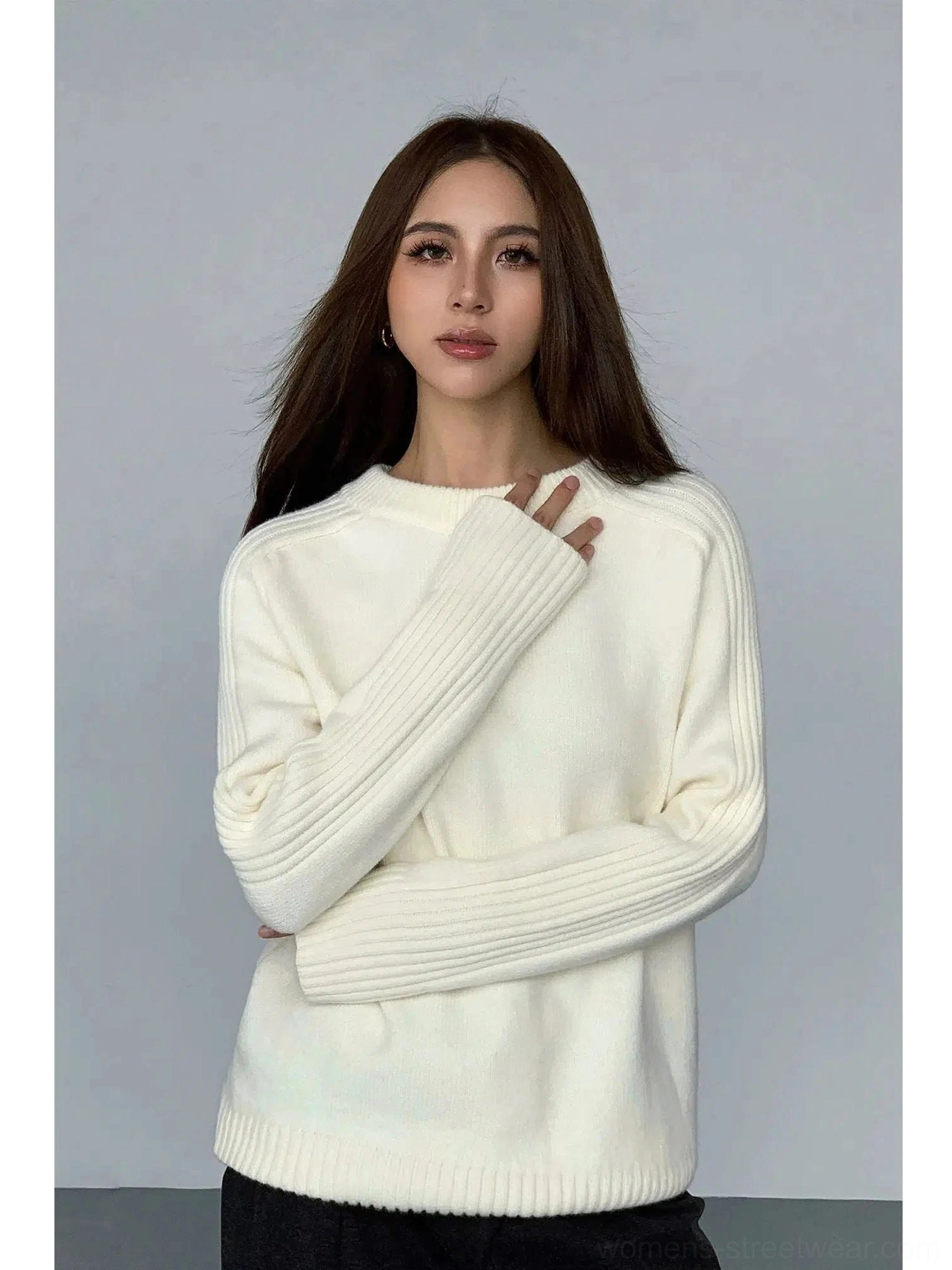 Apricot relaxed crew neck sweater with ribbed sleeve details and soft knit texture for Korean streetwear outfits
