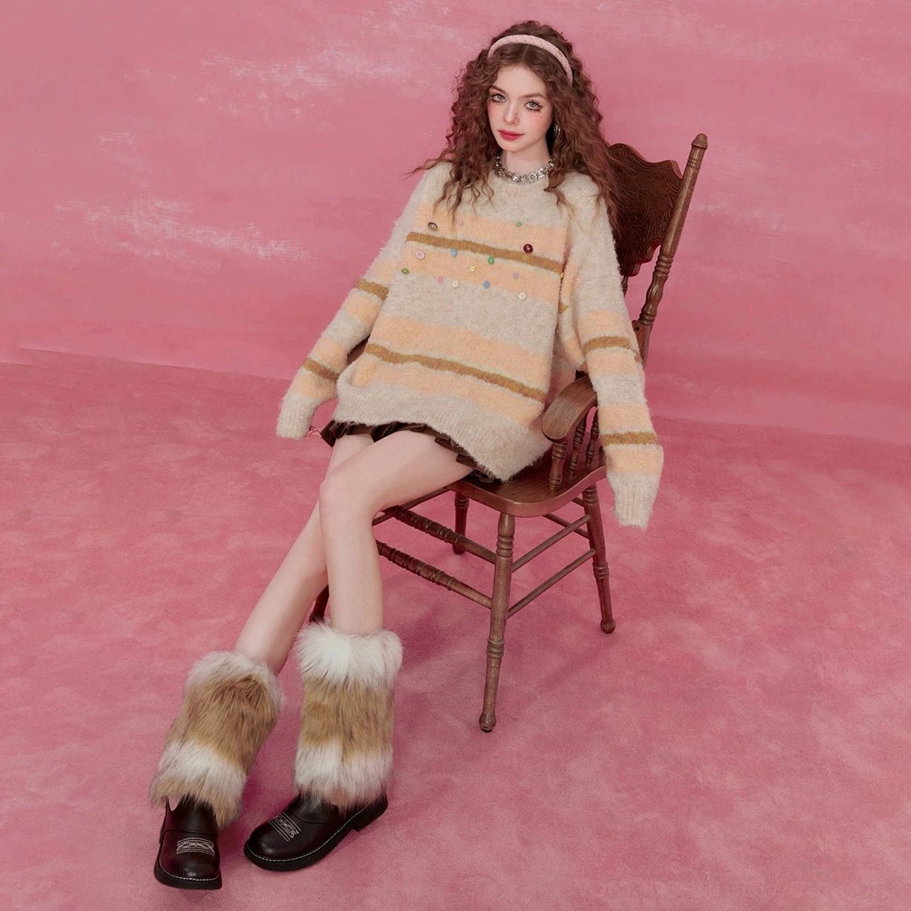 Apricot striped fuzzy knit sweater with colorful buttons in warm color-blocked colorway product image