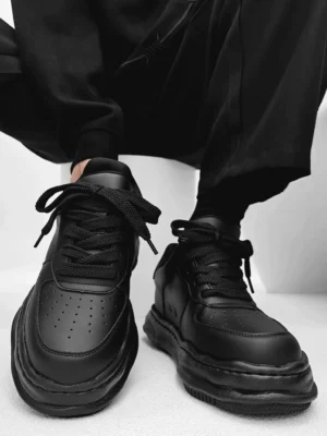 Arctic Crest black chunky platform sneakers front view with perforated toe box and thick sculpted sole
