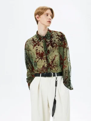 Army green semi-sheer floral streetwear shirt styled with a black tassel belt and high-waisted off-white wide-leg trousers