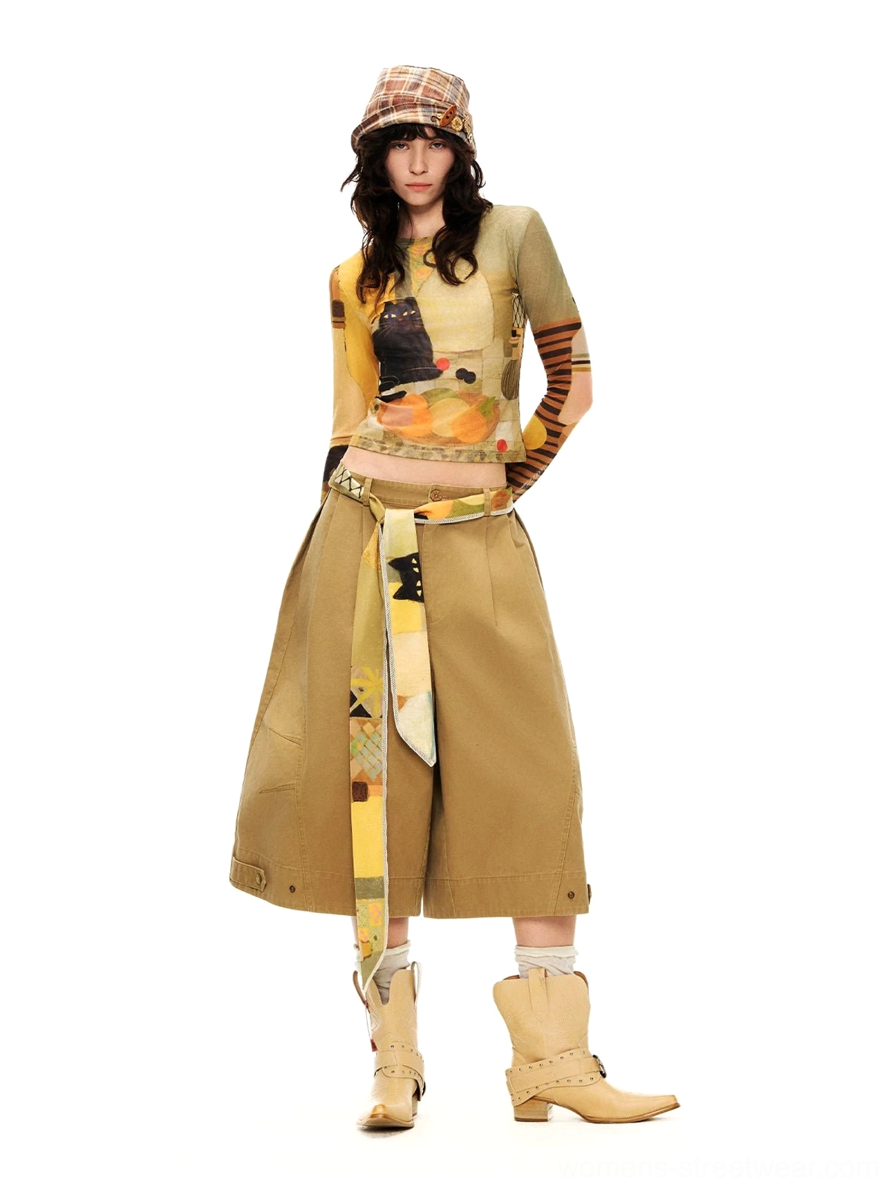 Cropped art still life cat print sheer mesh long sleeve top with brown trousers and cowboy boots