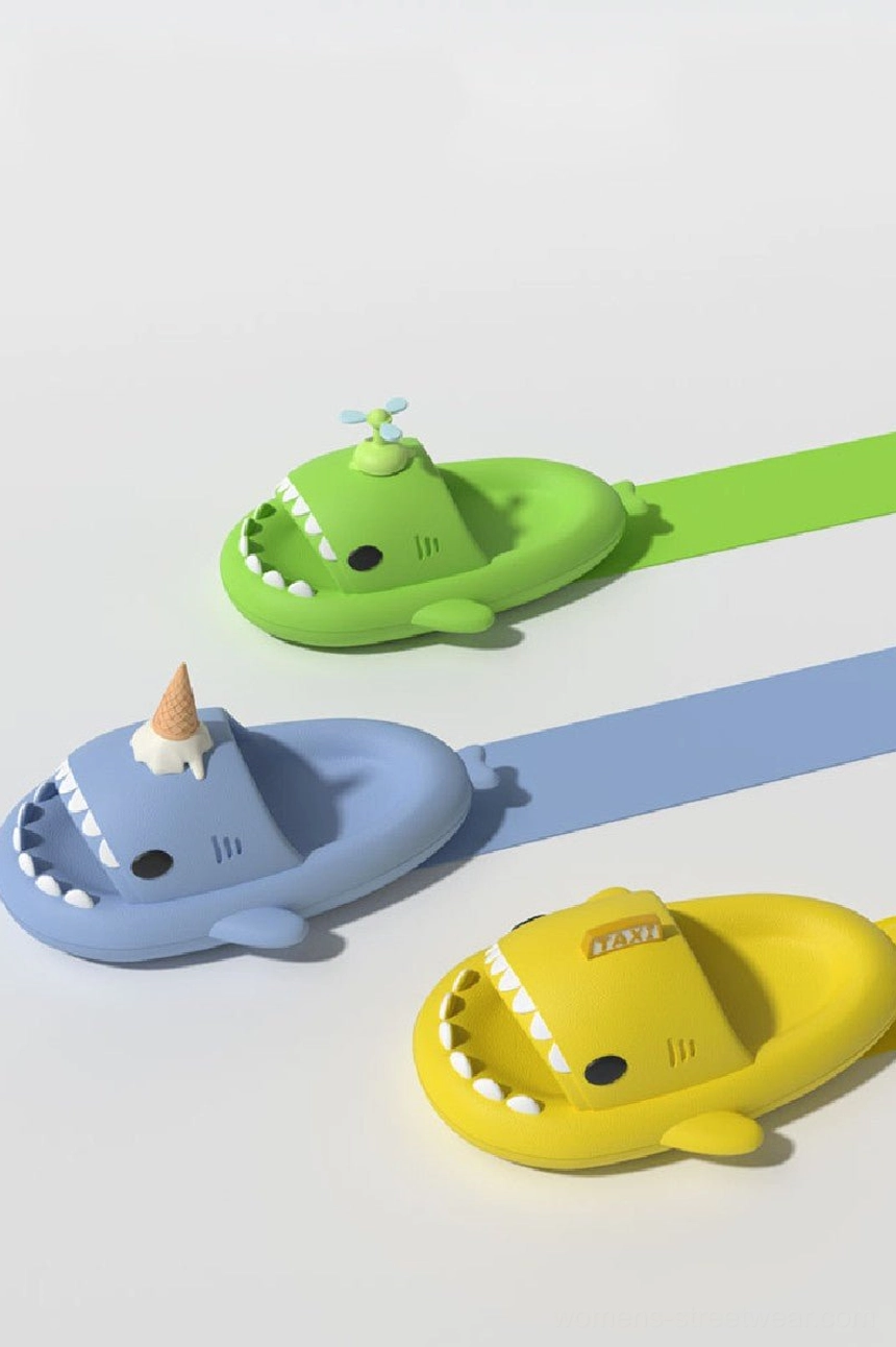 Assorted colorful shark slide slippers with playful character decorations for streetwear homewear