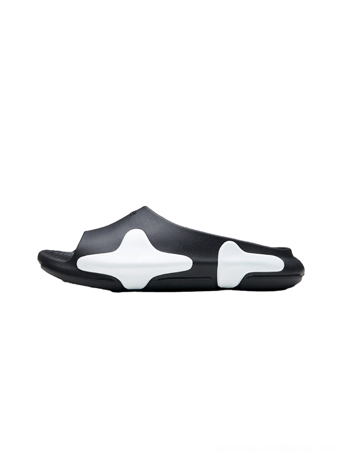 Black and white asymmetric colorblock cloud cushion slide sandal side profile on a clean white background
