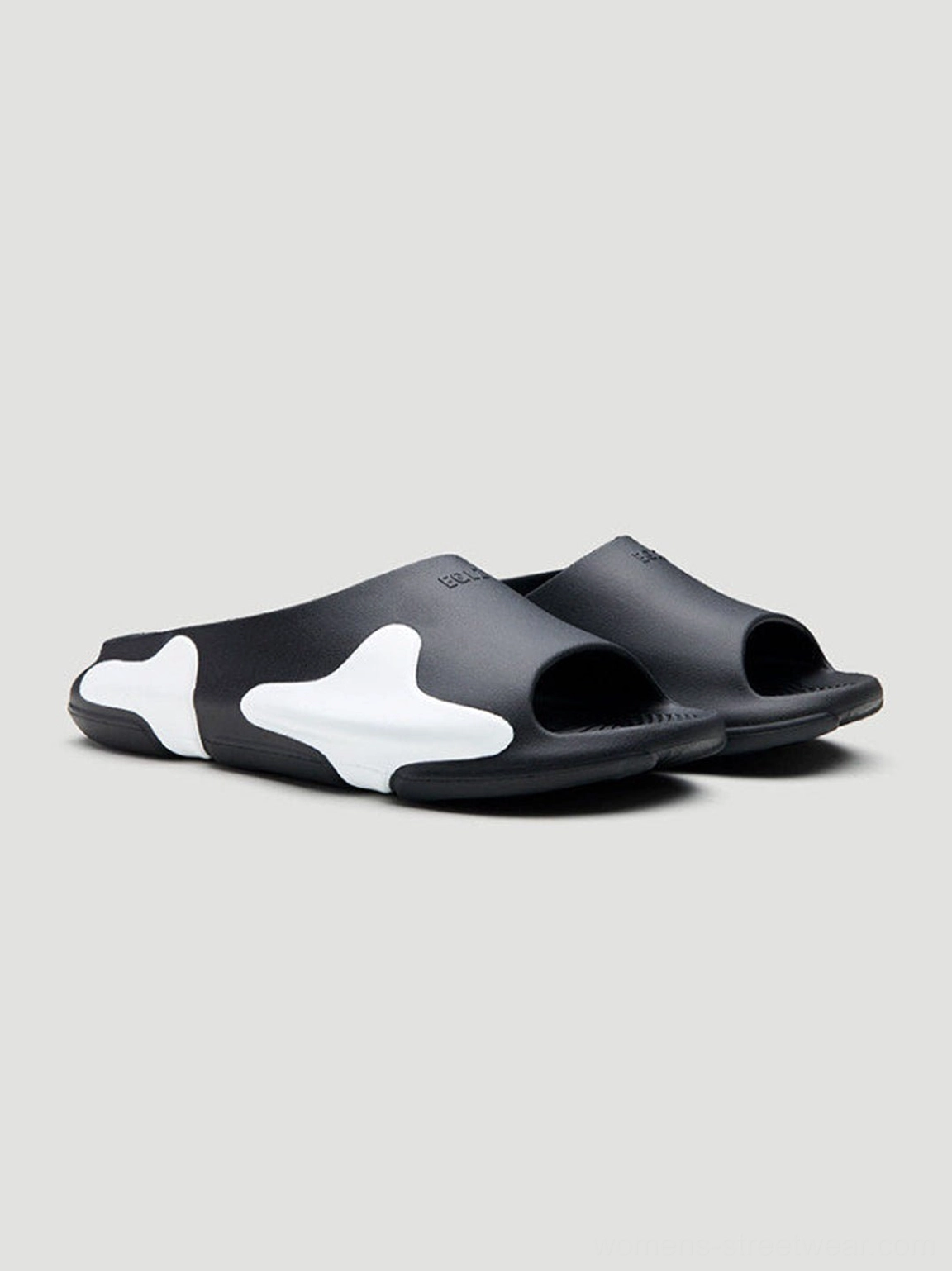 Asymmetric colorblock cloud cushion slide sandals product detail view with molded EVA comfort silhouette