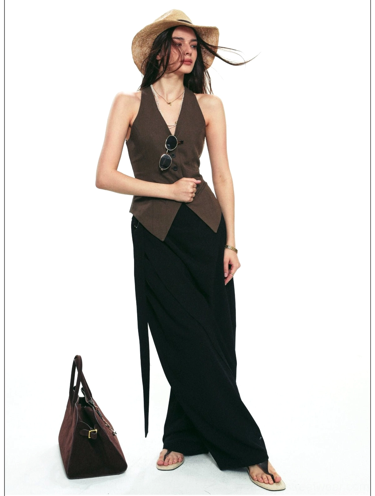 Black draped wrap wide-leg pants with fluid floor-length silhouette and layered waist styling