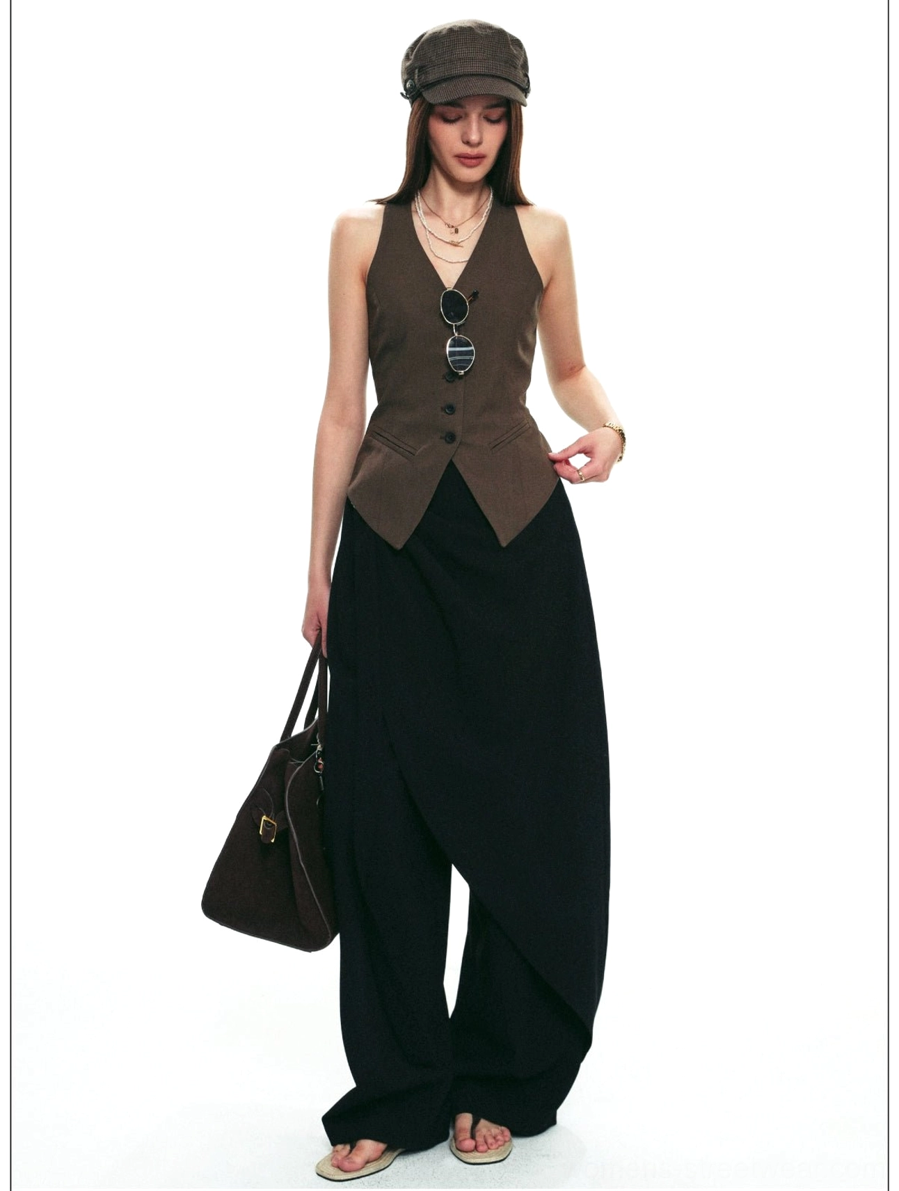 Black long wide-leg wrap pants styled in a Seoul-inspired minimalist streetwear outfit