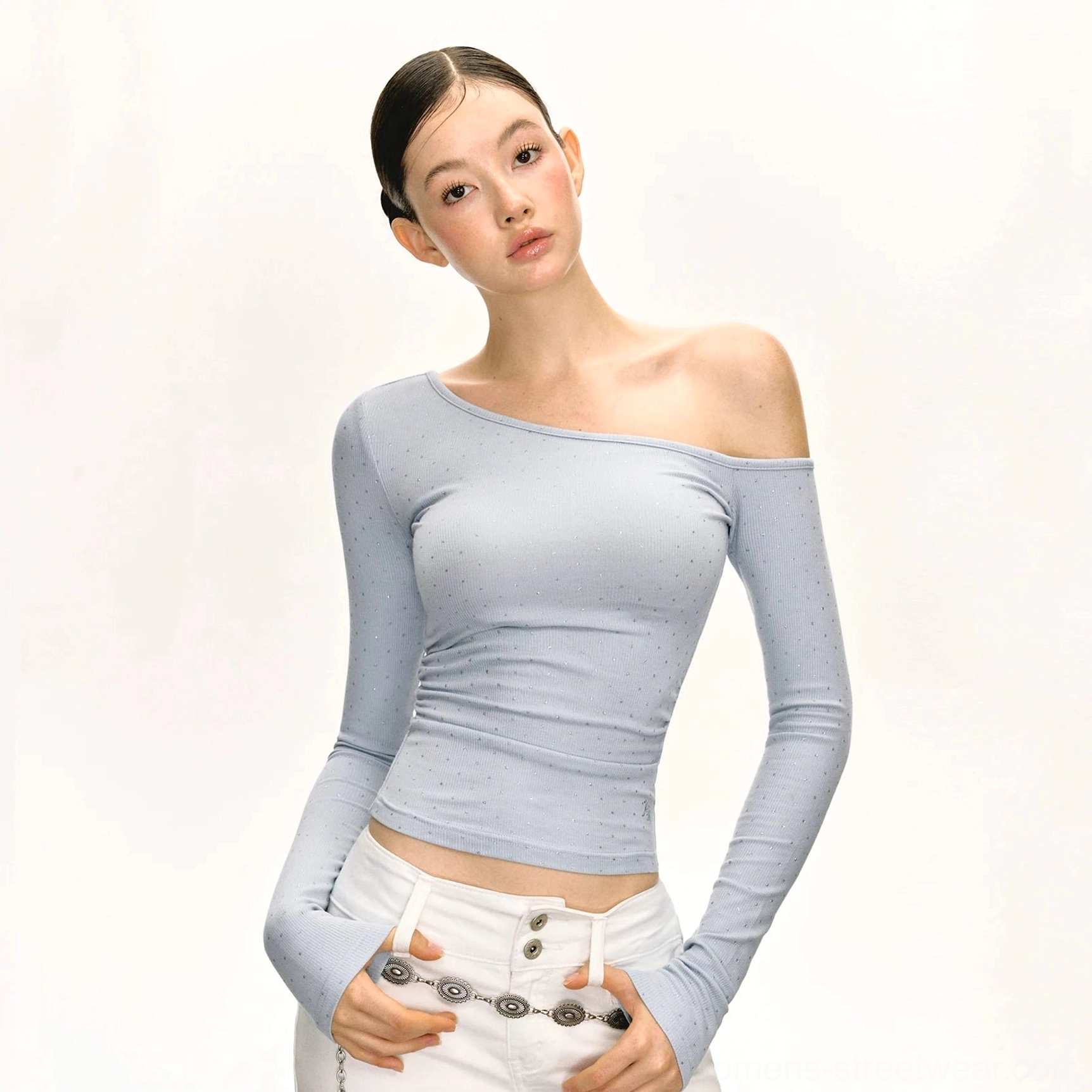 Light sky blue asymmetric off-shoulder ruched long-sleeve streetwear top styled with white low-rise pants