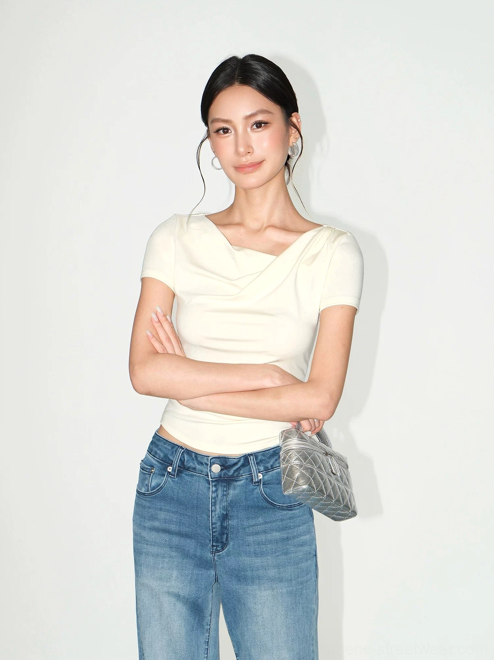 Cream twisted asymmetric collar ruched slim fit top with short sleeves and fitted waist