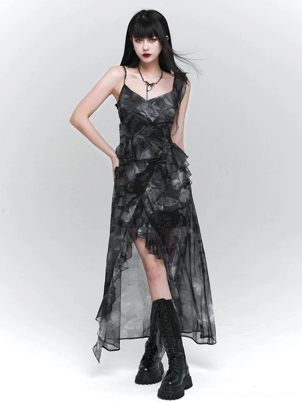 Side view of an asymmetrical floral slip maxi dress featuring sheer mesh fabric, vintage dark floral print, slim fit, and irregular floor-length skirt