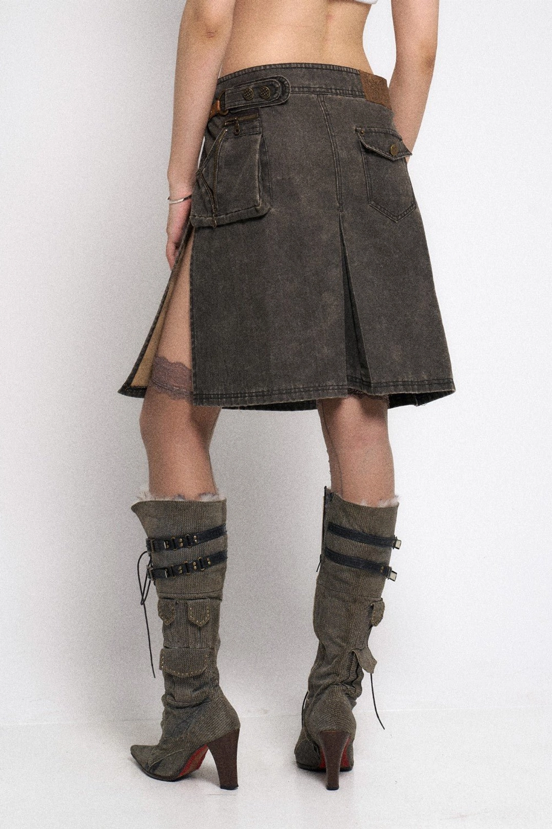 Asymmetrical gothic cargo mini skirt with detachable chain zipper details and low rise streetwear silhouette
