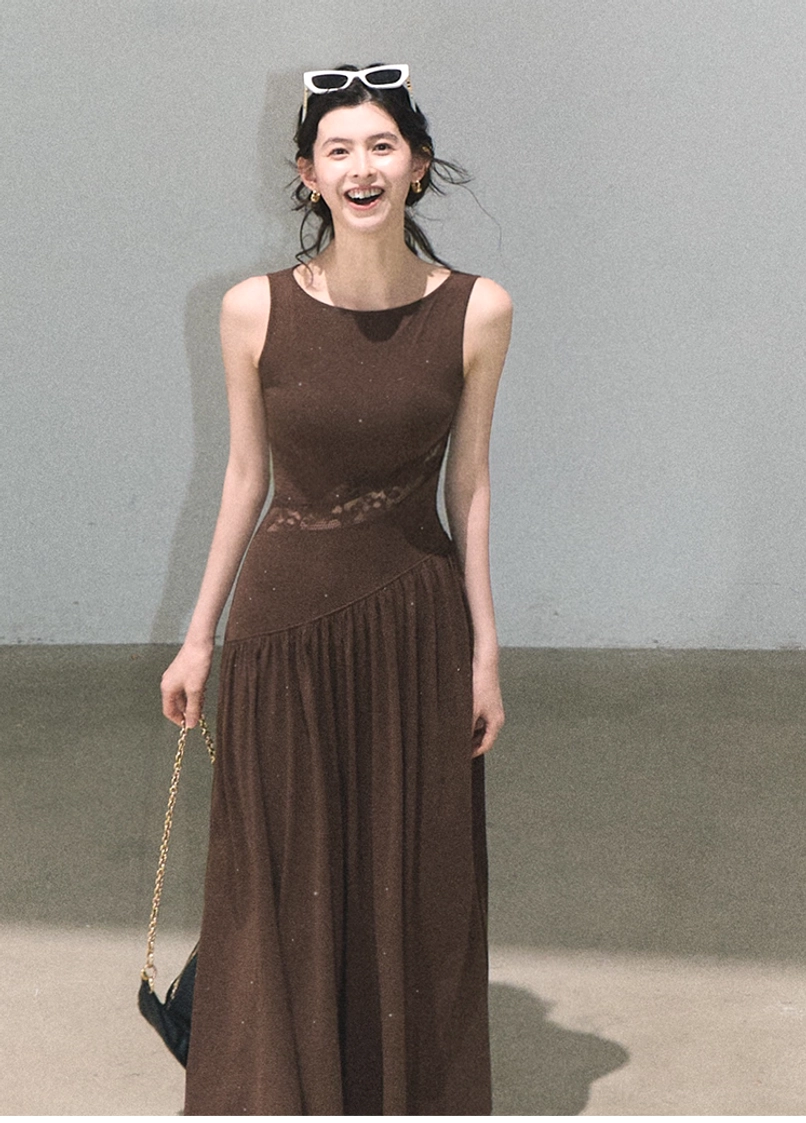 Asymmetrical lace dress outfit inspiration with elegant waist detail and versatile flared silhouette