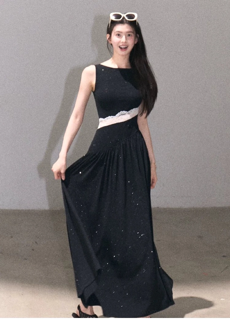 Asymmetrical lace waist dress detail highlighting the diagonal sheer lace panel and fitted cotton stretch bodice