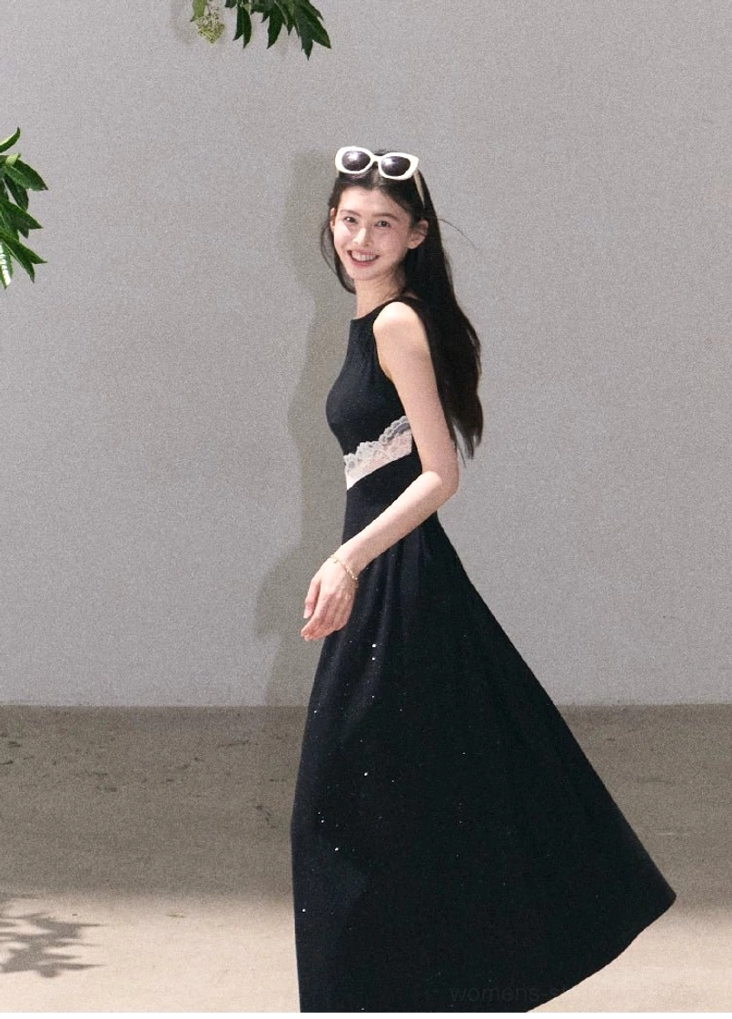 Asymmetrical lace waist dress with sleeveless boat neckline and contemporary flared streetwear silhouette