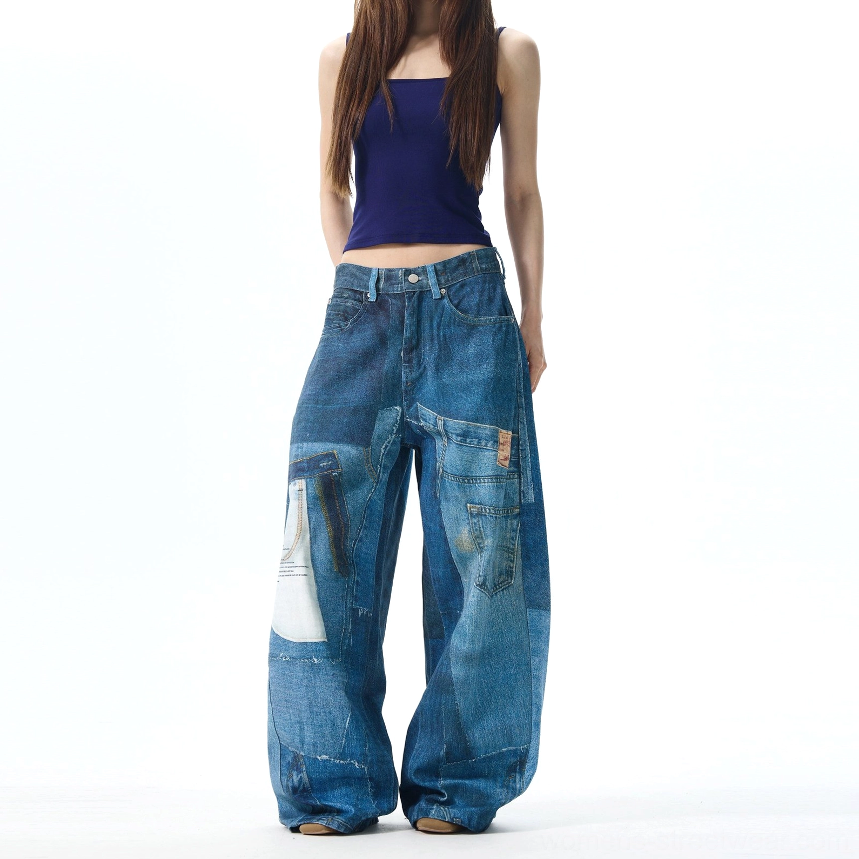 Front full-body view of women wearing asymmetrical patchwork wide leg denim jeans with loose oversized silhouette and contemporary Seoul street fashion style