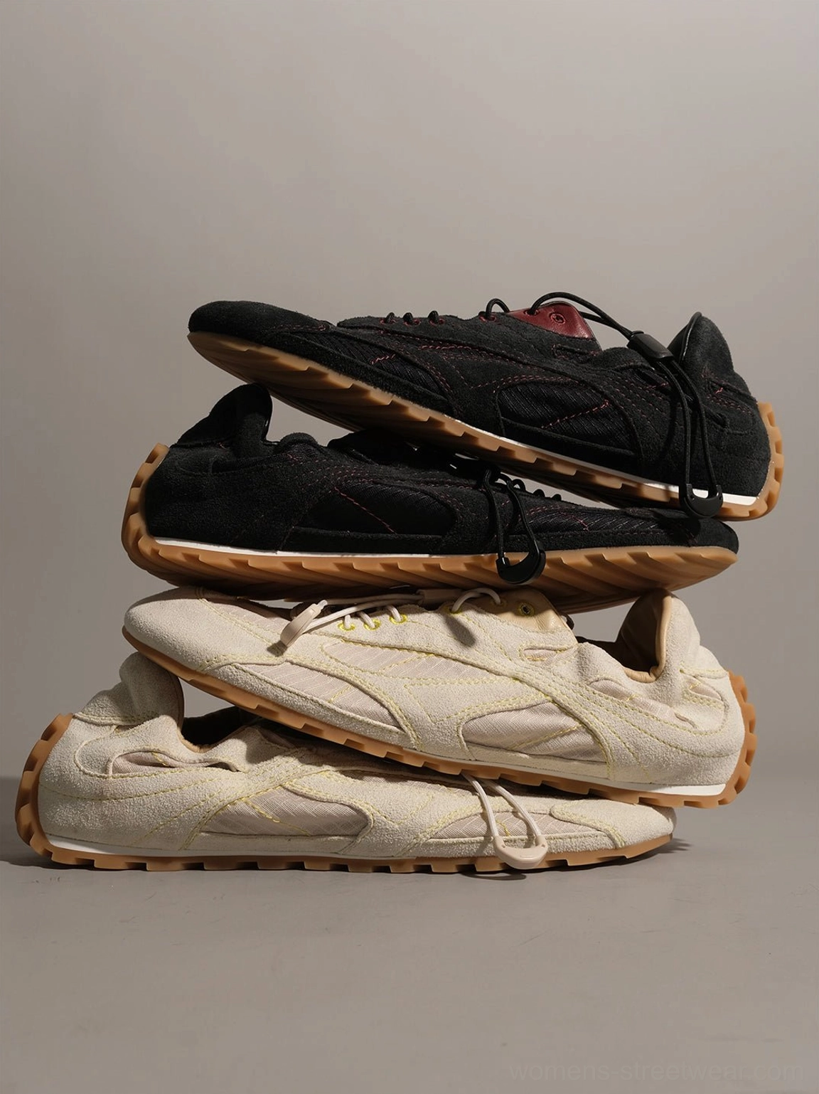 Avant-garde inspired low-profile nubuck trainers with offset lacing and rounded toe