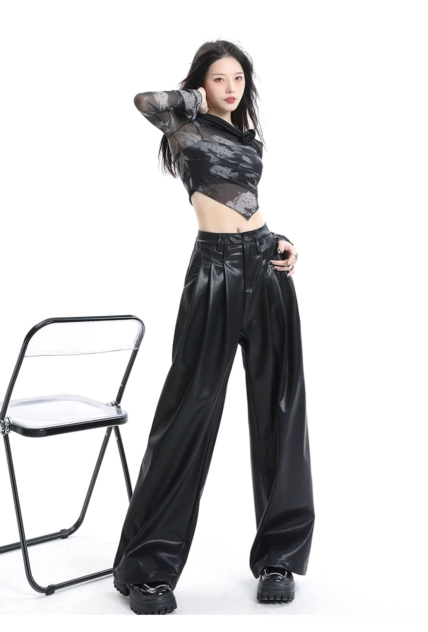 Avant-garde women’s coffee brown wide-leg PU leather pants with structured pleats and fluid floor-length drape