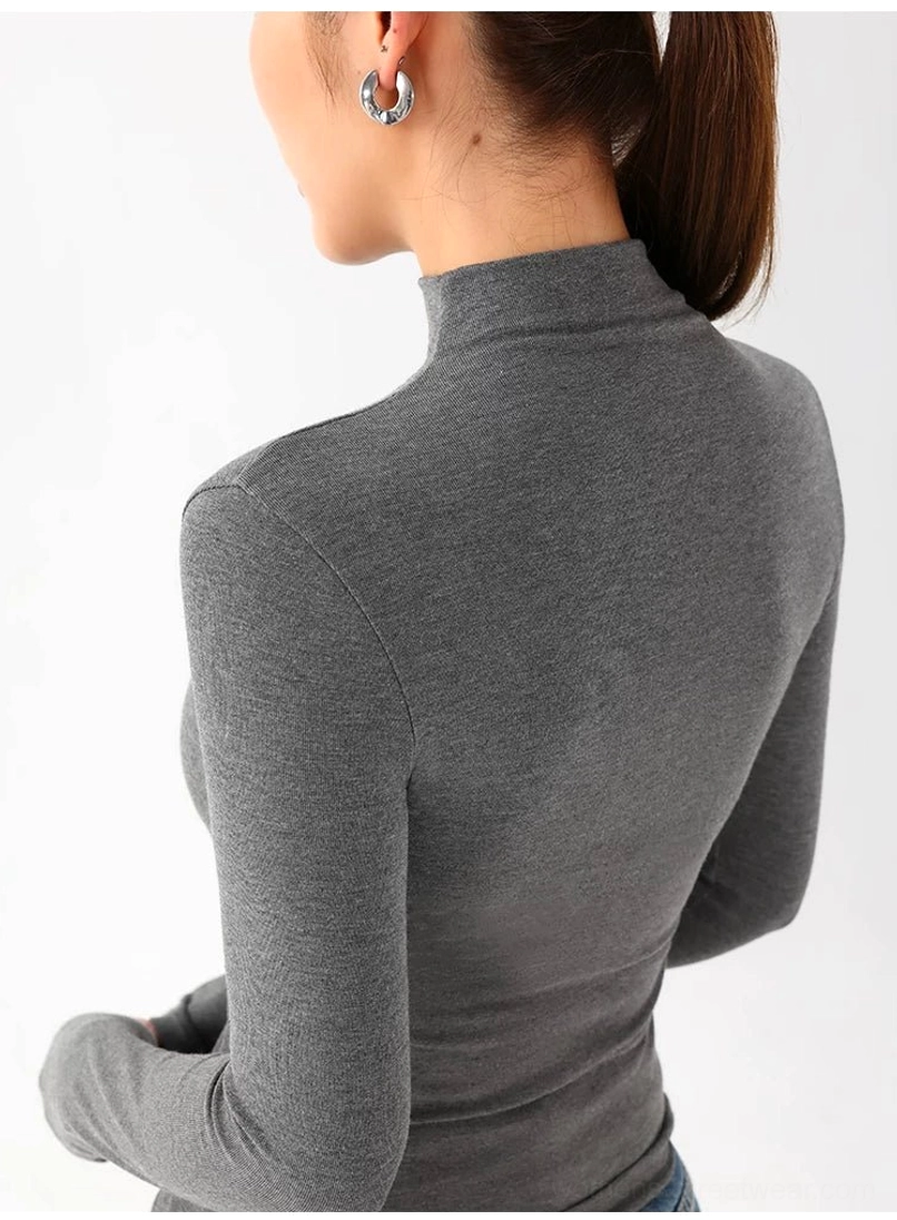 Back view of heather gray women's slim fit mock neck long sleeve knit top with clean streamlined silhouette