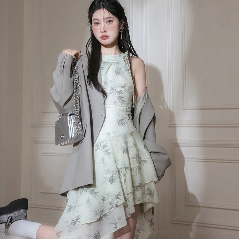 Flowing bamboo leaf print halter midi dress with asymmetric ruffled hem styled with grey blazer white socks and loafers