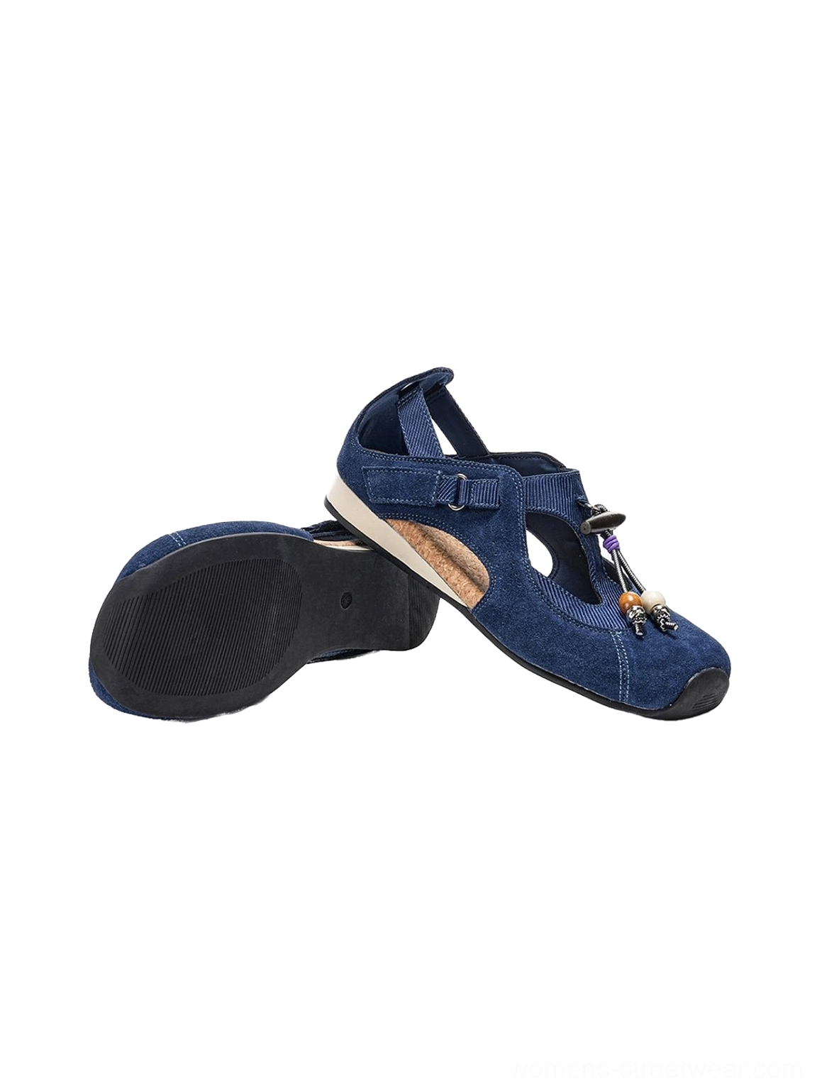 Pair of navy blue beaded T-strap cork footbed ballet sandals showing textured uppers, adjustable straps, and rubber outsole