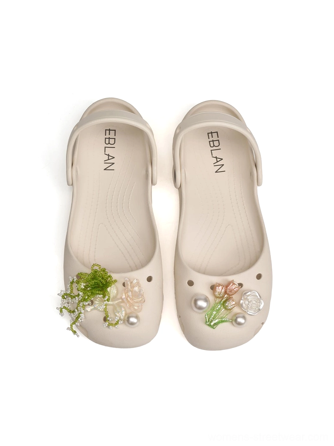 Beige breathable Mary Jane slide footwear with perforated upper lifted sole and expressive decorative details for city styling